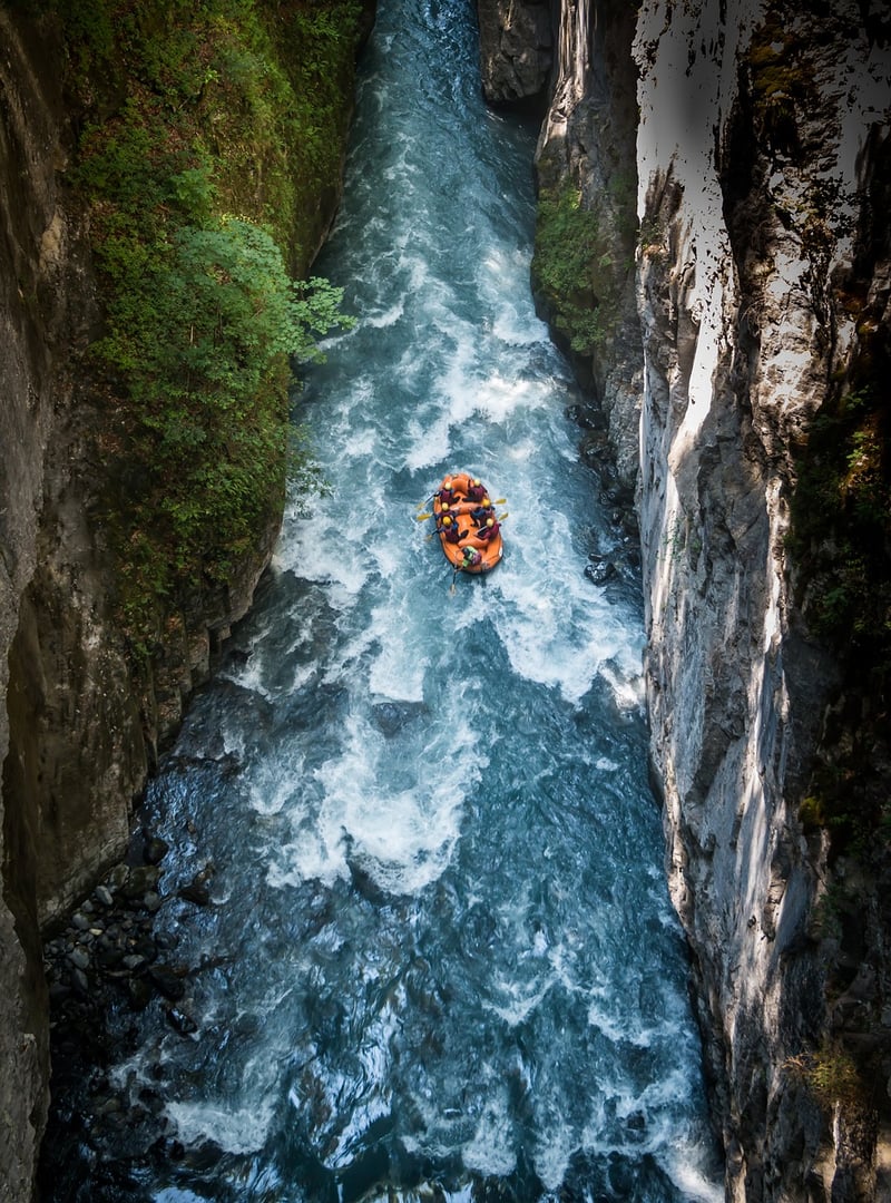Whitewater rafting through rapids